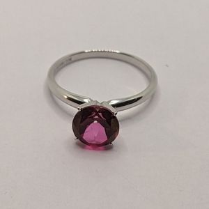 Sterling silver plated 10k ring, red stone